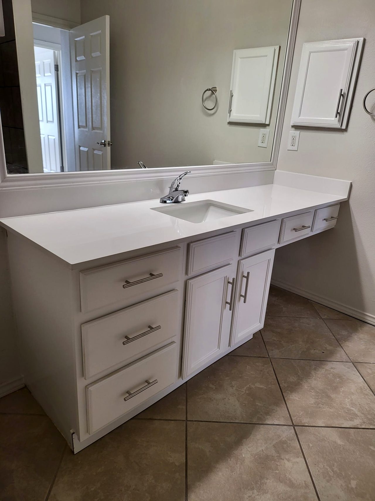 Oak cabinets refaced to white with new quartz peninsula counter