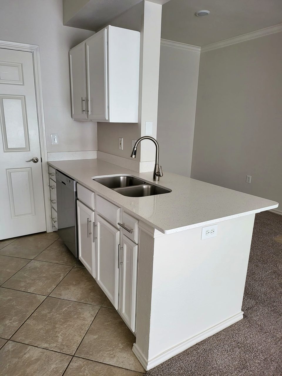 Oak cabinets refaced to white with quartz counters